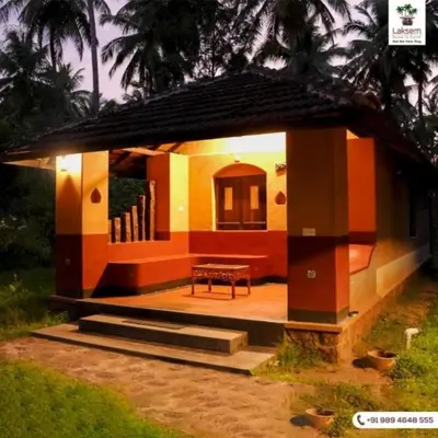 a model of a house with a bench in it at Down to Earth Farmstay by LAKSEM in Anaimalai