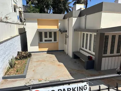 a house with a no parking sign in front of it at Heart of Mysore - Entire Place for yourself in Mysore