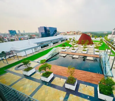 an overhead view of a pool on top of a building at Gokulam Grand Kozhikode in Kozhikode