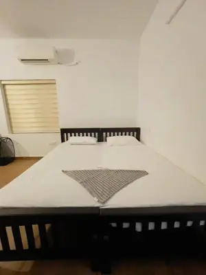 a large bed in a room with at RiverSoul Villa in North Paravur