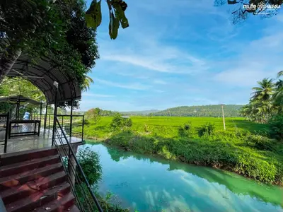 a view of a river from a bridge at Milife Medicity Perashannoor in Kuttippuram