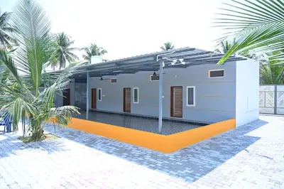 a rendering of a house with palm trees at Bhuvi farm & homestay in Channapatna