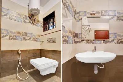 a bathroom with a sink and a toilet at Super Hotel O Rose Garden Ooty Formerly New Star Cottages in Ooty