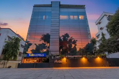 a building with a sign on the side of it at FabHotel Prime Royal Castle - Nr Coimbatore North Railway Station in Coimbatore