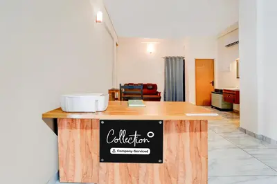 a counter with a sign on it in a room at Super Collection O Westhill Near Govt Engg College in Calicut