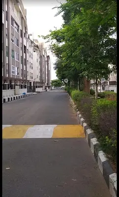 an empty street in a city with tall buildings at Regi's Adobe - Entire Place -Service Apartment for Rent in Coimbatore