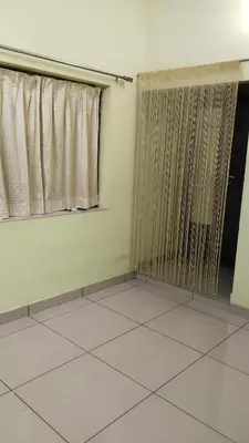 a room with a shower with a window and a tiled floor at ZAREPHATH PG Home in Trichūr