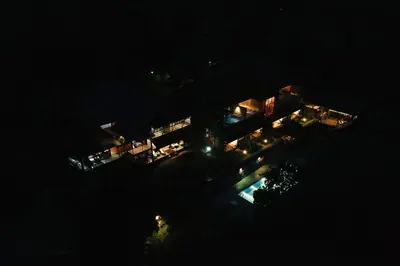 an overhead view of a building at night at Mayaahi Resorts & Spa in Nilambūr