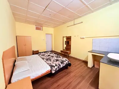 a bedroom with a bed and a sink in it at Ubuntu Retreat - Aaram & Mukaam in Ooty