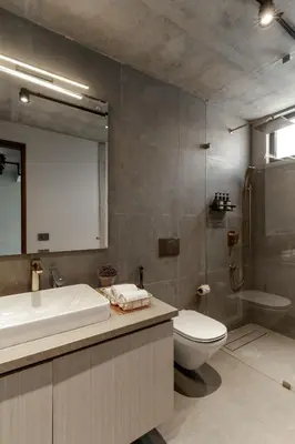 a bathroom with a sink and a toilet and a tub at LohonoStays Amani Villa 11B in Coonoor
