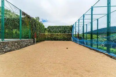 a batting cage with a ball in the dirt at Finch,Kotagiri in Kotagiri