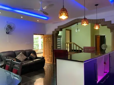 a living room with a bar and a couch at 
