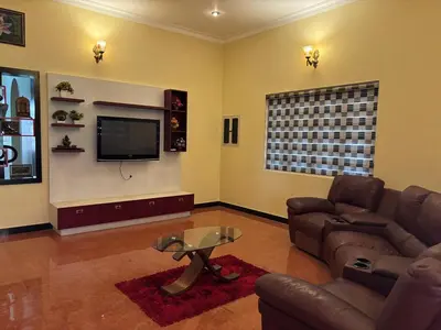 a living room with a couch and a tv at 