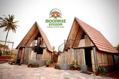 a building with a sign on top of it at Moonrise Kingdom Permaculture Farm Stay in Hura