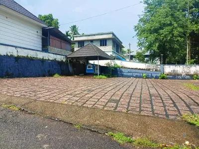 a brick driveway in front of a house at Boganvilla, Magic Land Resort in Athirappilly