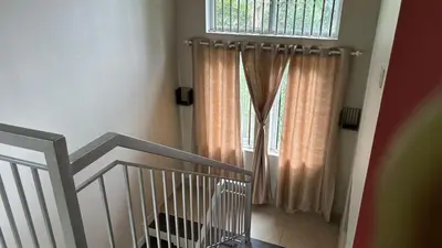 a stairway with a crib and a window at Vintage Coffee Premium Villa in Pinangode