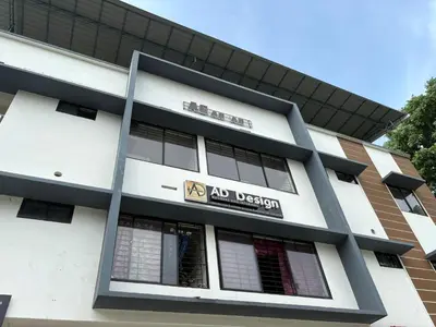 a building with a sign that reads ana usoren at AC Arcade in Parli