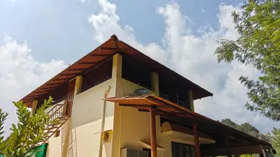 a house with a gambrel roof at Eagles Nest in Dimbam