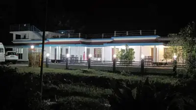 a house lit up at night with lights at Jewel Homes Thattekad For birding and families - An ISO9001 ISO14001 ISO22000 Certified in Thattakād
