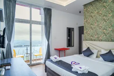 a hotel room with a bed and a large window at Le Karaj Meadows in Lovedale