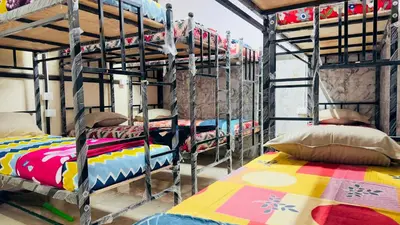 a room with four bunk beds in a room at Mysuru dorm-sgh in Mysore
