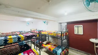 a room with four bunk beds in a room at Mysuru dorm-sgh in Mysore