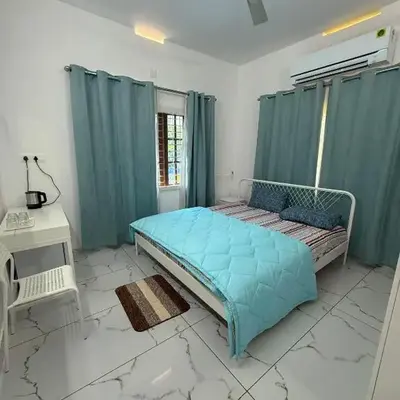 SRI Villa Rooms in Wayanad - Family Villa Stay with Mountain views