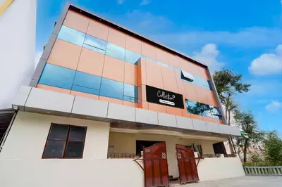a building with a sign on the side of it at Collection O IIT College Coimbatore in Coimbatore