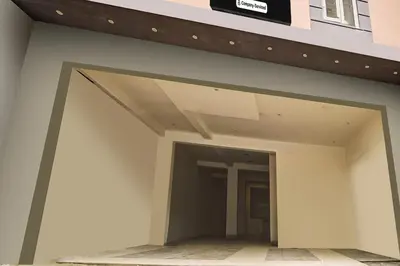 an open garage door on a building at Super Collection O RS Puram North Railway Station Formerly RG Residency in Coimbatore