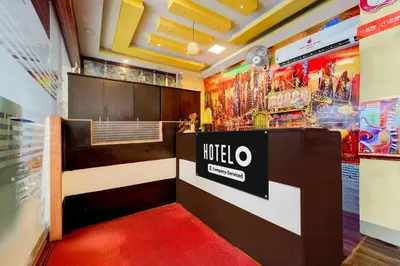 a booth at a wildo event with a red carpet at Hotel O Gandhipuram Central Bus Stand in Coimbatore