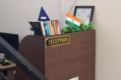 a wooden box with a sign that reads reception at bohom STAYORA in Nedumbassery