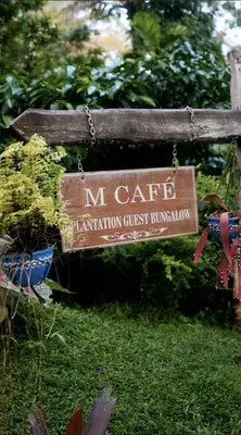 a sign that says n cart stimulation guest bunatown at Mcafe Private Pool Plantations by Greenescapes in Kenichira