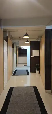 a room with a hallway with a hallway sidx sidx sidx at Lowfare Hotels Medical College in Kozhikode