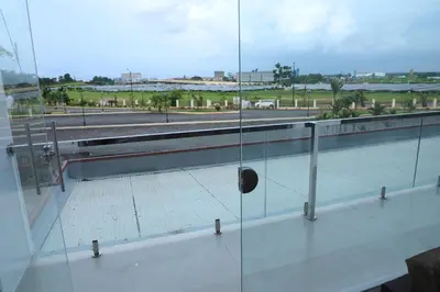 a view of a street from a building with a window at Aura Airport Hotel in Nedumbassery