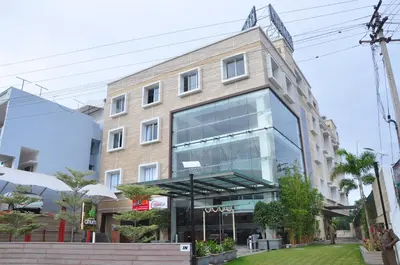 an office building with a large window at Hotel Atrium in Erode