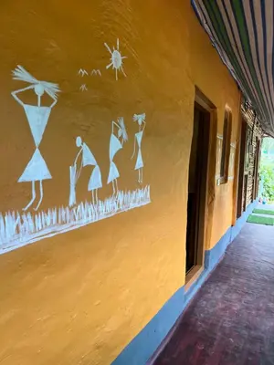 a painting on the side of a building at Kovilakam in Vattavada