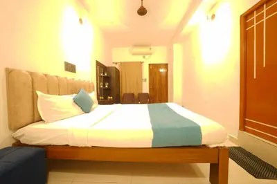a bedroom with a large bed in a room at Cozy retreat in Mysore