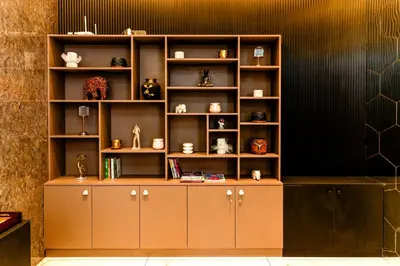 a shelf with various items on it in a room at AE Tower Platinum Retreat in Sultan Bathery