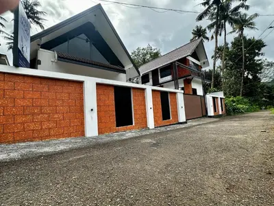 a house on the side of the road at Cloud Lacasa in Athirappilly