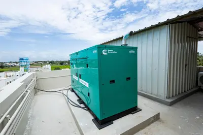 a green electrical box sitting on top of a roof at Sree Home Stay and Service Apartment Coimbatore in Irugūr