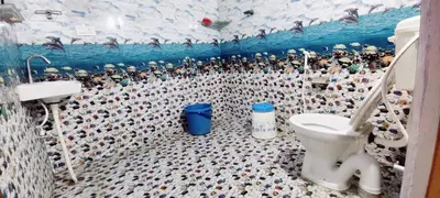 a bathroom with a lego bathroom with a toilet at Nature stay GF in Hārohalli