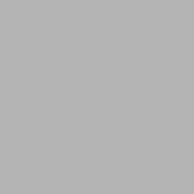 a tall white building with windows at Hotel O OZONE Residency in Kozhikode