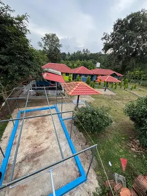 an overhead view of a batting cage in a park at Coorg Sunrise Cottage Homestay in Kushālnagar