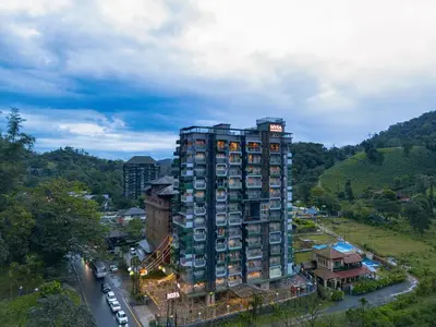 an overhead view of a tall building in a city at MYSA Sky Suites, Lakkidi in Vythiri