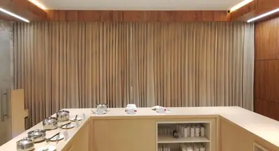 a bathroom with a sink and a mirror at Vanaalayam Retreat Palladam By Arcadia in Palladam