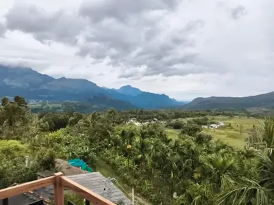 a view of the mountains from the house at Wildlife Homestay in Kanthalloor