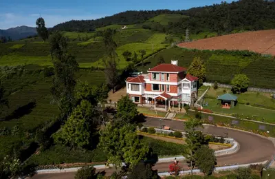 an aerial view of a house in a vineyard at Western Valley Resorts Ooty in Ooty