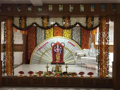 a room with a altar with a shrine and a throne at Sathya Inn Guruvayur in Trichūr
