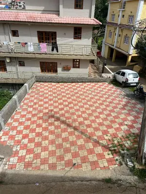 an overhead view of a house with a tile floor at Essar Cottage in Ooty
