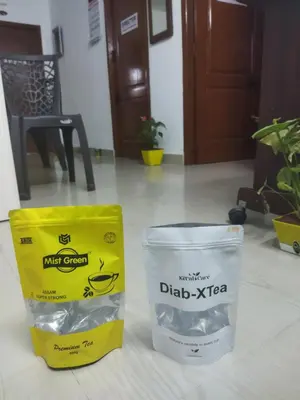 a pack of milk cream and a container on a floor at WooLiv in Coimbatore
